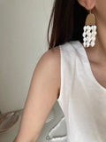 ShellCascade Earrings – Handcrafted Natural Sea Shell & Gold-Plated Copper Geometric Dangle Earrings