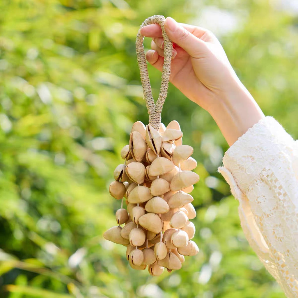 Chacha Seed Shell Hand Bell – Golden Spark
